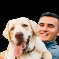 Chico abrazando a su labrador